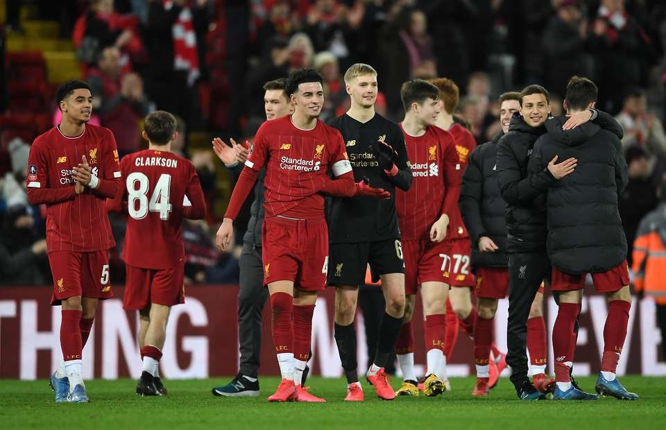 Liverpool fans showered under 23